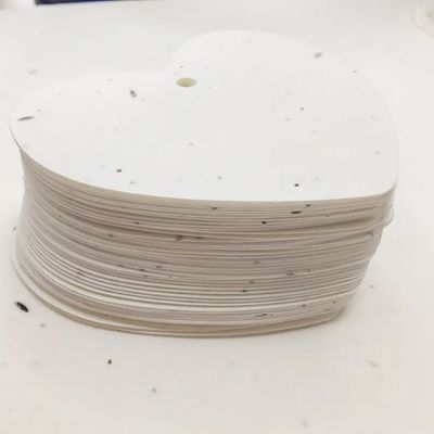 200 grammes de papier à graines en blanc incorporé 0,3 mm - 0,5 mm Épaisseur 100 feuilles